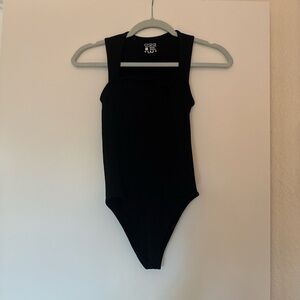 Elegant Black Sleeveless Bodysuit